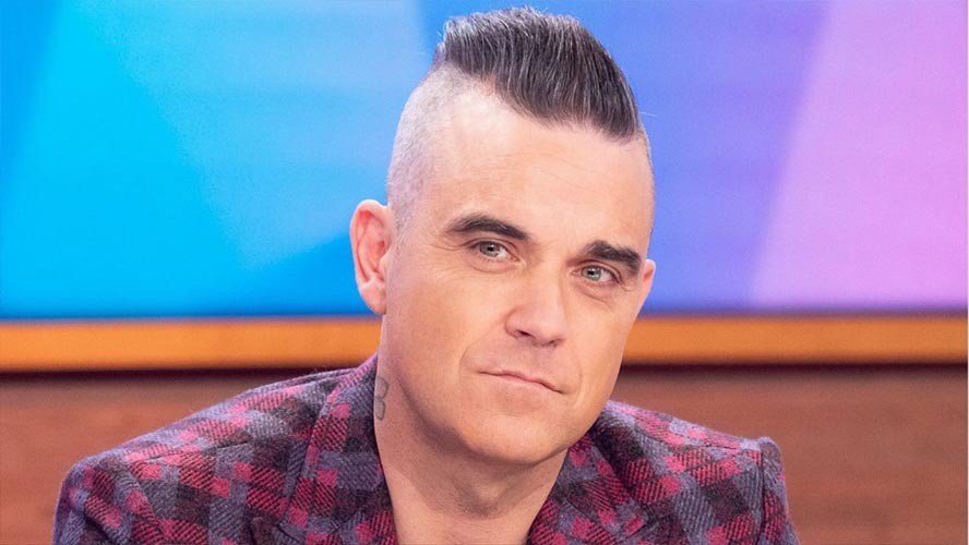 Un hombre afirma que encontró a Robbie Williams a bordo de un OVNI | Curiosidades