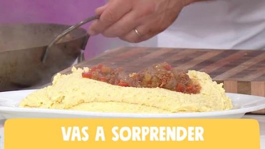 Polenta cremosa con salsa bolognesa