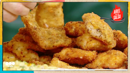 Receta de pescado frito con macarrones de humita gratinados